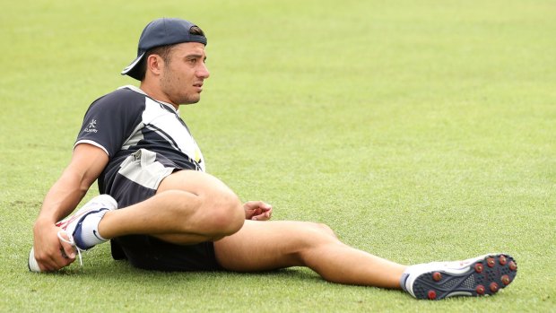 Marcus Stoinis stretches before play during the Sheffield Shield match between Victoria and WA in Alice Springs on Tuesday.