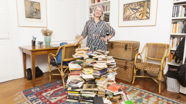 Susan Wyndham after clearing out her bookshelves under the guidance of decluttering expert Kim Carruthers in 2013.