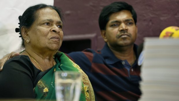 Myuran Sukumaran's grandmother and uncle, Edith Visvanathan and Roshan Visvanathan, with the petitions.