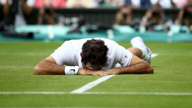 Roger Federer down and out.
