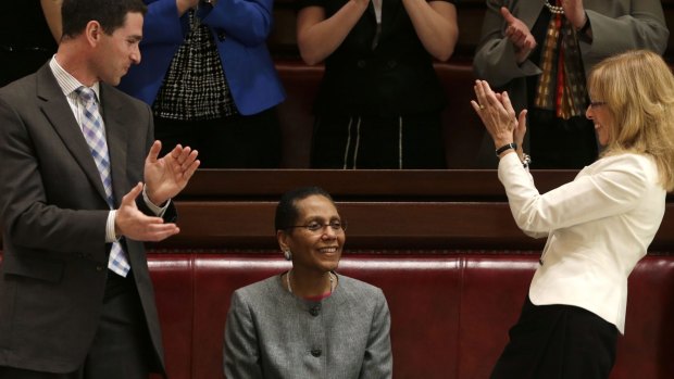 Justice Sheila Abdus-Salaam, centre, after her confirmation to serve on the New York State Court of Appeals in 2013.
