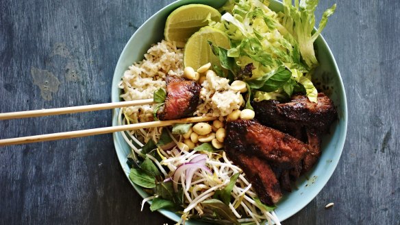 Black pepper and kaffir lime beef bowl with coconut rice and salad.