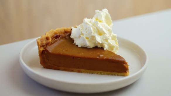 A golden slice of pumpkin pie.