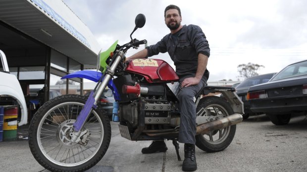 35 year old auto electrician Tim Kiernan of Wanniassa is entering his 1985 BMW K100 motorcycle in the Scrapheap Adventure Ride in September to raise money for Down Syndrome NSW.