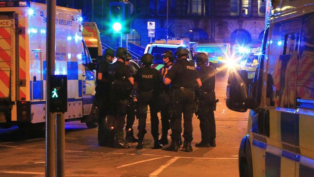 Police gather at the Manchester Arena in northern England