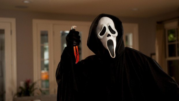 The killer Ghostface  in <i>Scream<i/>, directed by Wes Craven. 