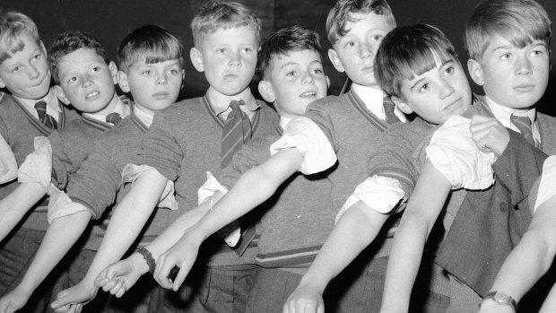 Pupils at Scotch College, Melbourne, line up for Salk vaccine injections in 1956.