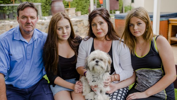 The Downes family's dog Bailey just scraped through after toxic poisoning. 
from left, Dean, Jessica 19, Leah, Kristen 17, and Bailey the shih tzu.
