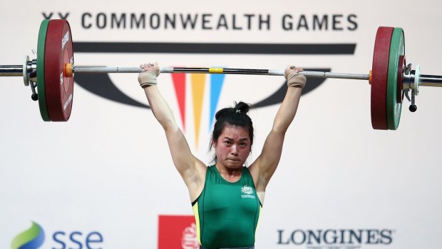 Socheata Be of Australia lifts in the women's 53kg.