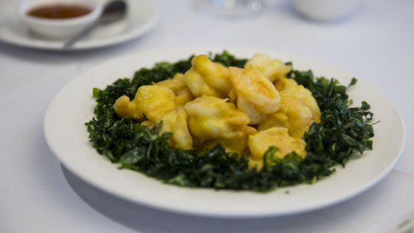 Mustard king prawns on a bed of deep-fried spinach is a signature.