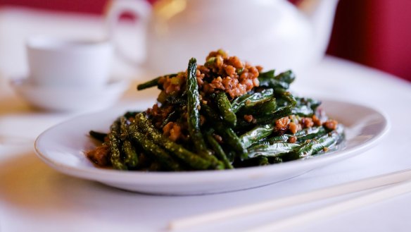 Temptress spring beans braised in ginger and bolstered by pork mince and dried shrimp.