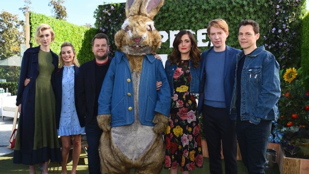 The cast of Peter Rabbit: Elizabeth Debicki, Margot Robbie, James Corden, Peter Rabbit, Rose Byrne, Domhnall Gleeson and Will Gluck in London earlier this month. 
