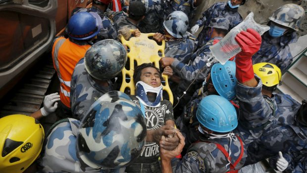A 15-year-old boy has been plucked from the rubble five days after the massive earthquake.