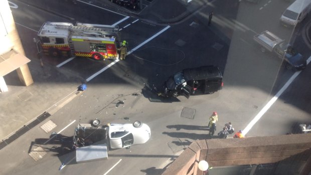 The two vehicles crashed at the intersection of Druitt and Sussex streets in Sydney's CBD just after 9am.