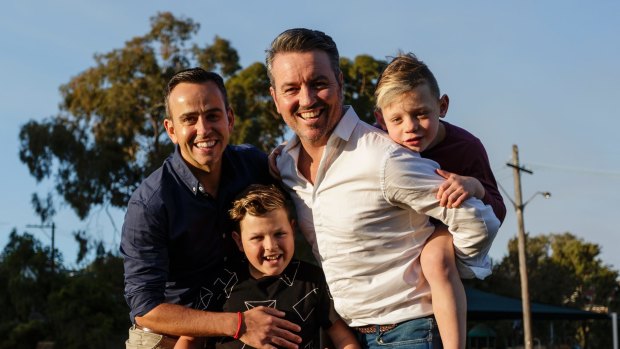 Simon Duffy and his partner Wally Murphy with their sons, Corey (12) and Val (6), in Rozelle.