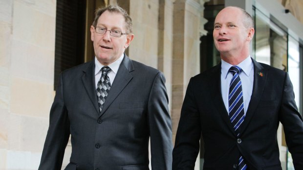 Bruce Flegg walks beside premier Campbell Newman.