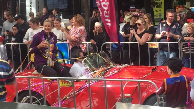 The Firebirds were greeted with a ticker tape parade in Brisbane today.