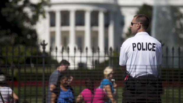 US Secret Service stands guard on the south side of the White House.
