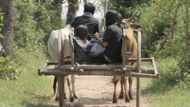 In a scene from the film "Camp 32", a family is transported to the countryside in an oxcart to be executed.