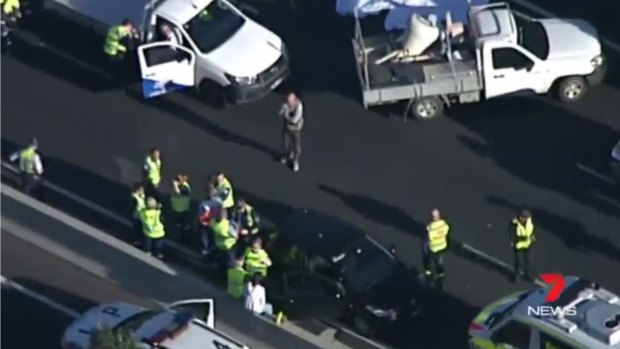 Emergency services at the scene of a fatal motorbike crash on the M5 motorway in Sydney.