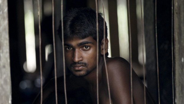 A refugee from Bangladesh, rescued by the Myanmar navy, at a Muslim religious school used as a temporary refugee camp in Myanmar.