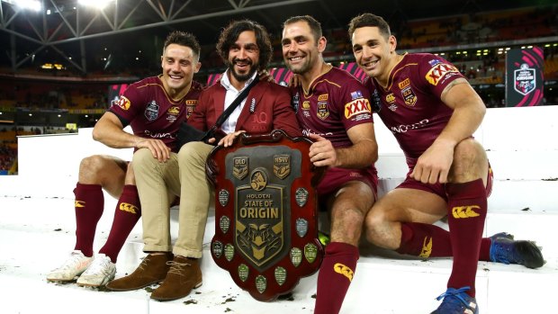 Origin greats: Cooper Cronk, Johnathan Thurston, Cameron Smith and Billy Slater celebrate yet another series win.