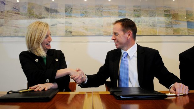 Katy Gallagher and Shane Rattenbury after signing the power-sharing agreement in 2012.