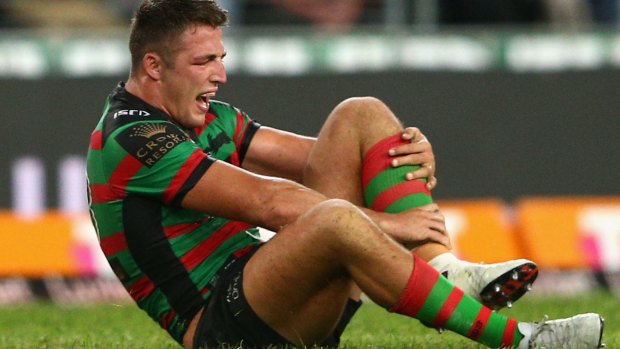 Sore one: Sam Burgess left ANZ Stadium in a protective boot.