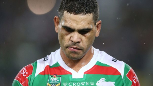 Depression: Greg Inglis, pictured walking from the field after a devastating knee injury in March, has checked himself into a clinic.