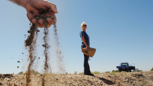 Brother and sister farmers Chris (left) and Claire Priestley on their drought-affected property near the outback town of Walgett, NSW.