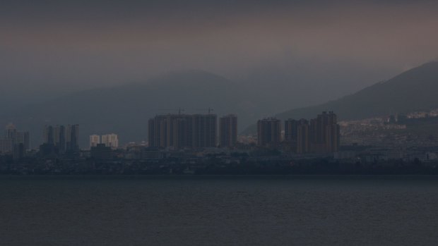 Apartments have popped up around Erhai Lake, polluting its waters.