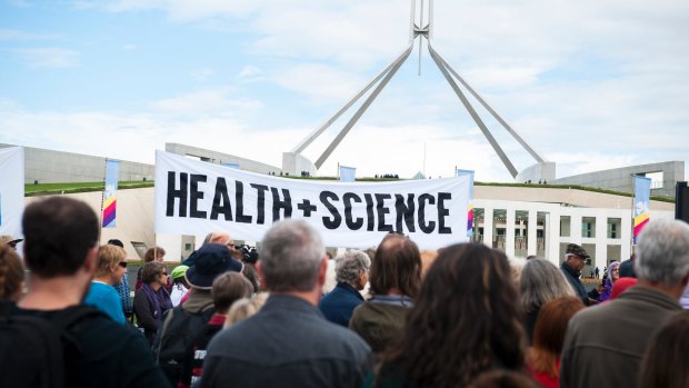 Protesters gather outside Parliament House for the March for Science.