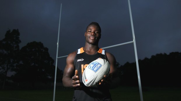 Dodging a bullet: Wests Tigers rookie Obed Karwhin escaped war-torn Ivory Coast to make a new life in Sydney.