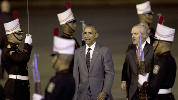 US President Barack Obama walks past the honour guard in Panama.