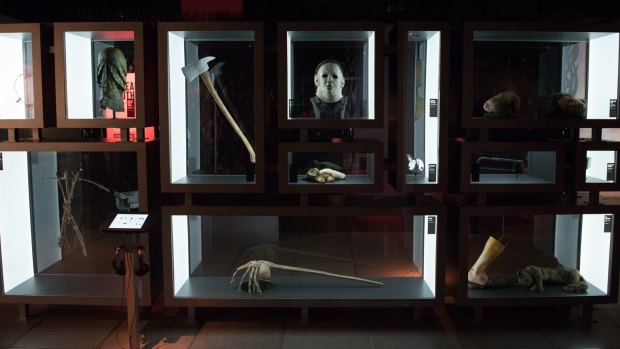 Props from Halloween, Gremlins, Aliens and other horror movies in the "Scared to Death" gallery of MoPop.