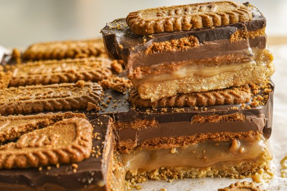 Caramel slice stacked with Biscoff biscuits and spread.