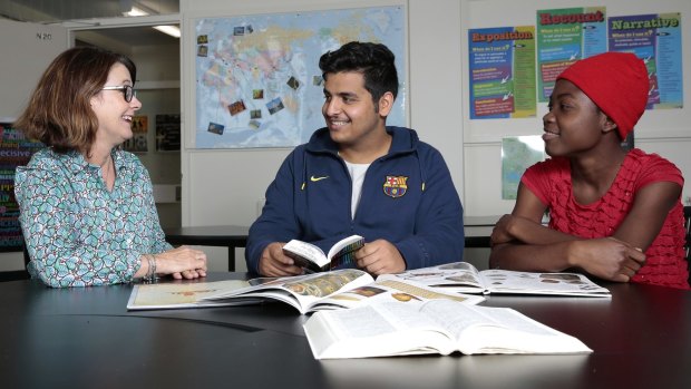 New  centre: Secondary Introductory English Centre executive teacher Ros Phillips with students Ahmad Al Rowais from Saudi Arabia and Dada Merritt from Hati at the centre at Dickson College.
