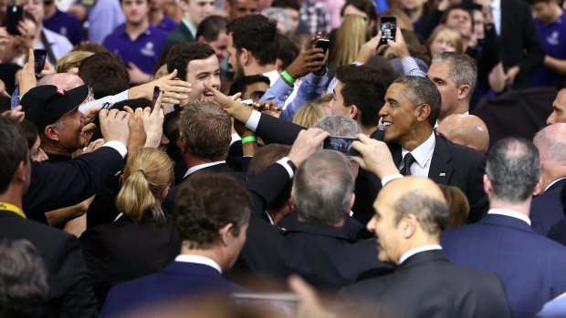 Crowd appreciation: Greetings from President Obama following his speech at the University of Queensland.