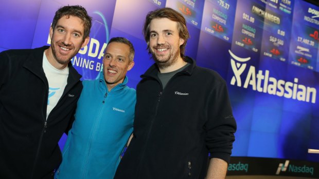 Co-founders Scott Farquhar, left, and Mike Cannon-Brookes, right, at the Atlassian IPO dedicated the day to team work. 