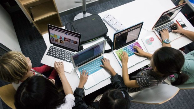 Students during a coding class at the First Code Academy in Hong Kong.