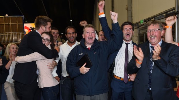 Former Northern Ireland finance minister Sammy Wilson (far right) leads celebrations for the Leave campaign at the count in Belfast.