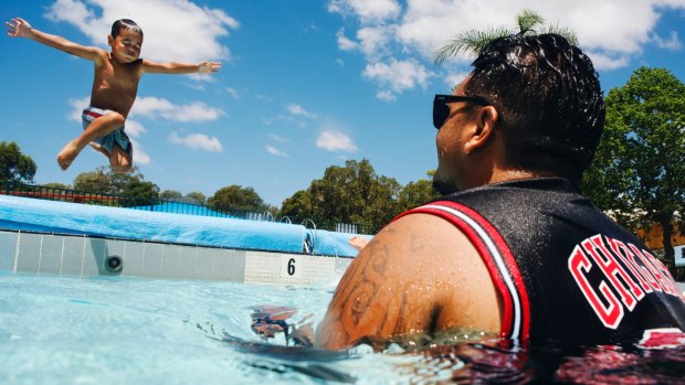 Dee Owen with his 4yo son Jodeci Owen at Merrylands Swimming Pool. 