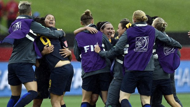 Another step closer: Lisa De Vanna and the Matildas celebrate their win over Brazil.