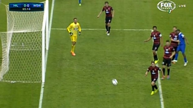 Matthew Spiranovic, right, is headbutted by Nasser Al-Shamrani.