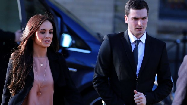 Adam Johnson and girlfriend Stacey Flounders arrive at court in Bradford on Thursday.
