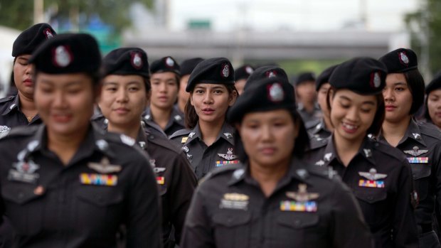 Police officers deployed outside the Thai Supreme Court ahead of the scheduled  verdict on charges accusing former Prime Minister Yingluck Shinawatra of negligence in implementing a rice subsidy.