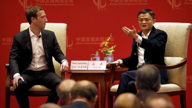 Mark Zuckerberg, left, with Jack Ma, executive chairman of the Alibaba Group, at the China Development Forum in Beijing.