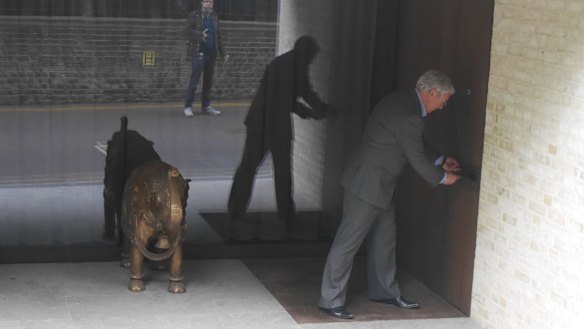 Former trader turned activist Arthur Doohan posts an 'unexplained wealth order' into an alleged kleptocrat's letterbox.