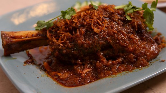 Slow-braised mutton leg with roti.