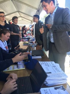 New members sign up to the Sydney University Liberal Club's stall on orientation day.